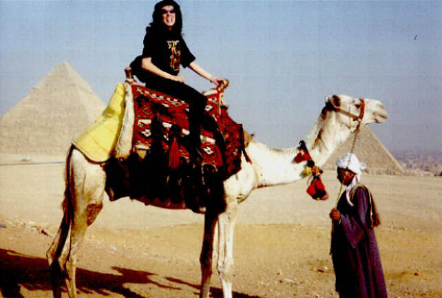 Daleela at the Pyramids, on a camel