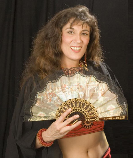 Daleela belly dances with a Spanish Fan